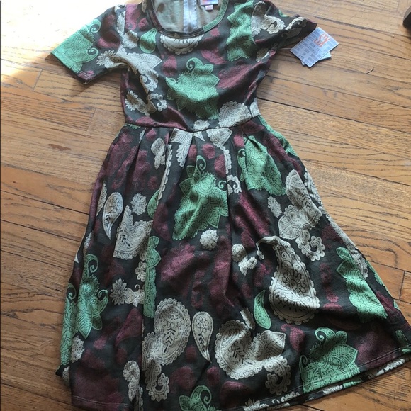 LuLaRoe Dresses & Skirts - Woman’s lularoe dress size xs new comfortable